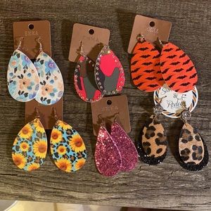 Multiple size and shapes of dangle earrings